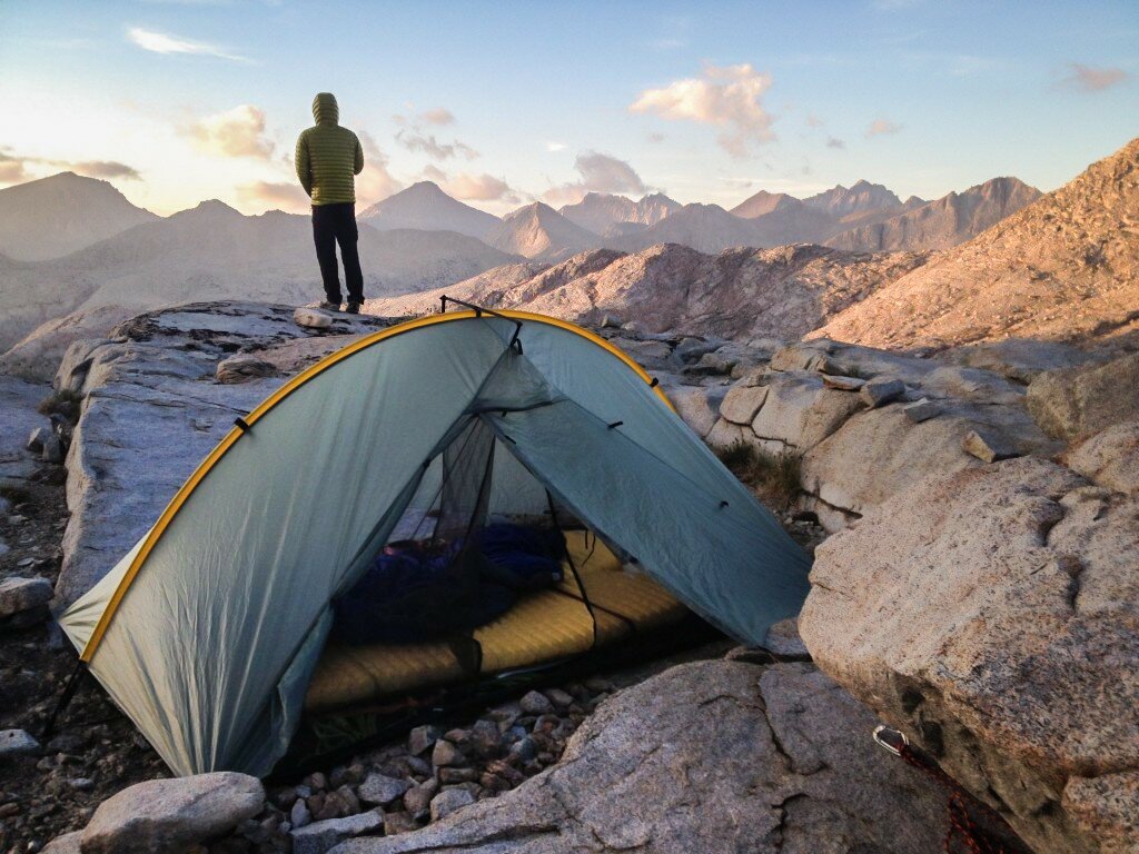 hiking with a tent фото