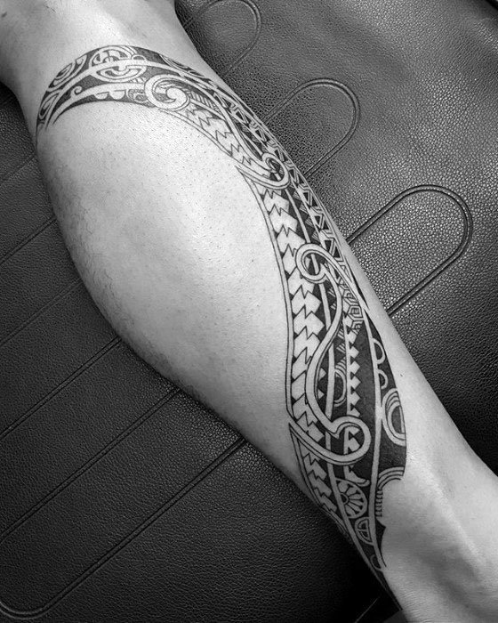 polynesian tattoo on the leg фото