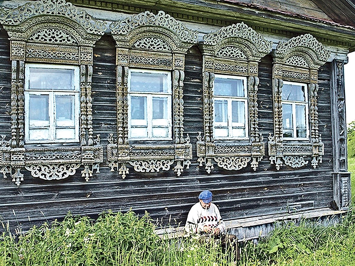 резные избы фото