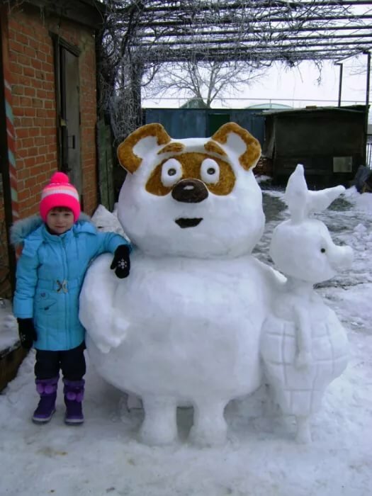 звери из снега фото