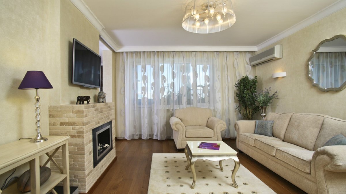 интерьер зала с камином в квартире фото